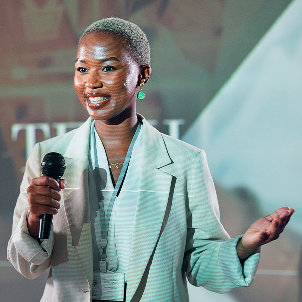 Professional woman with red balloons